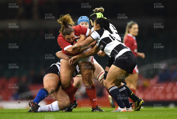 301119 - Wales Women v Barbarians Women - International Rugby - Gwenllian Pyrs of Wales is tackled by Steph Te Ohaere-Fox and Ruahaei Demant of Barbarians