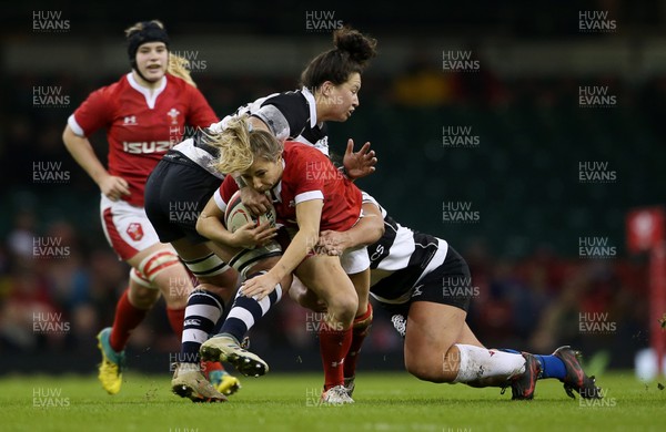 301119 - Wales Women v Women Barbarians - Elinor Snowsill of Wales is tackled by Charmaine McMenamin and Silvia Turani of Barbarians