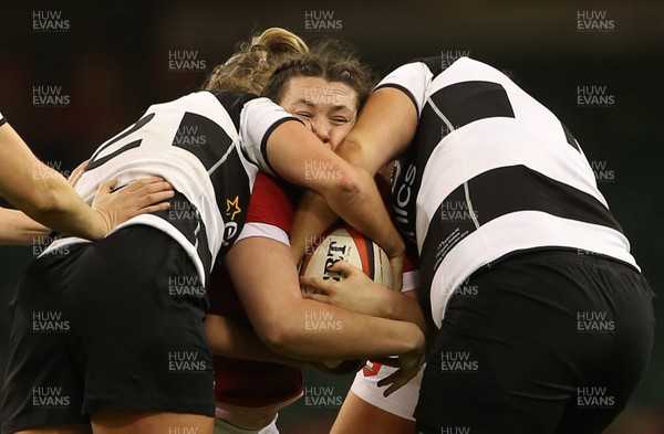 301119 - Wales Women v Women Barbarians - Cerys Hale of Wales is tackled by Clara Nielson and Steph Te Ohaere-Fox of Barbarians