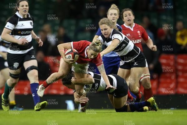 301119 - Wales Women v Women Barbarians - Keira Bevan of Wales is tackled by Tess Gard'ner of Barbarians