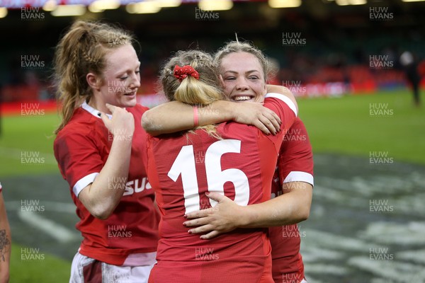 301119 - Wales Women v Women Barbarians - Molly Kelly and Kelsey Jones of Wales embrace at full time