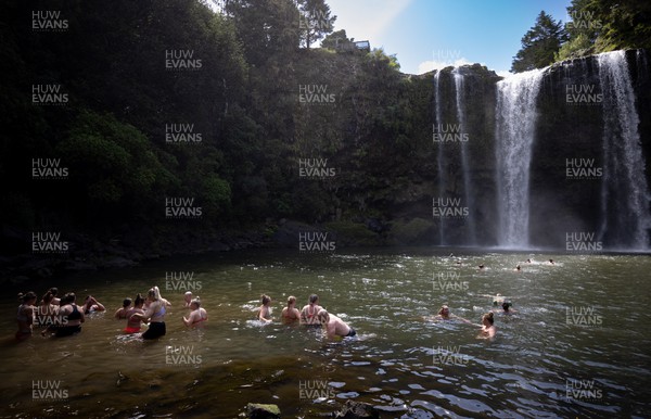201022 - Wales Women Waterfall Recovery Session - Members of the Wales Women’s Rugby team enjoy a recovery session at waterfalls near Whangarei after training ahead of their Women’s Rugby World Cup match against Australia