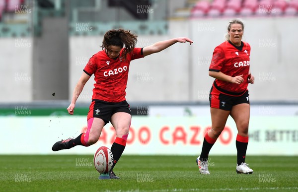 120322 - Wales Women XV v USA Falcons - Robyn Wilkins of Wales kicks at goal