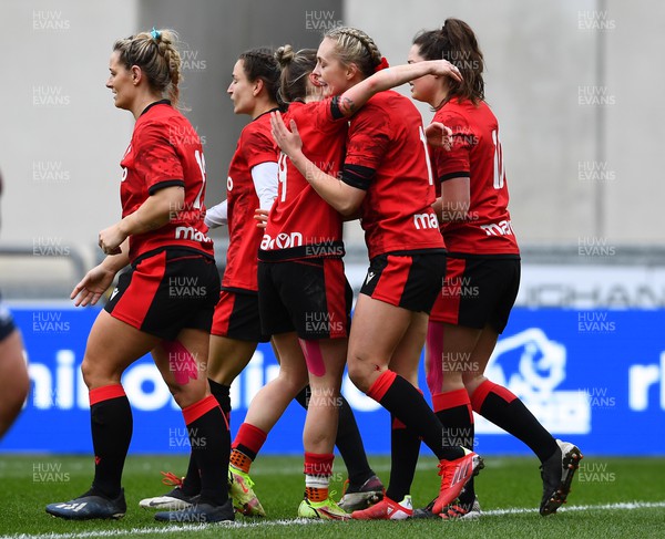 120322 - Wales Women XV v USA Falcons - Hannah Jones of Wales celebrates scoring try with Keira Bevan