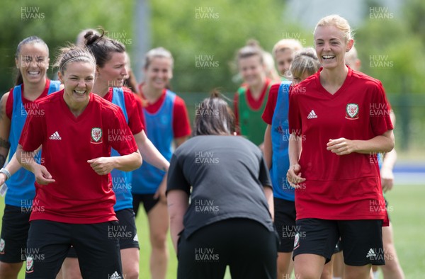 030619 - Wales Women's Football Squad Training Session - Wales' Loren Dykes, left, and Sophie Ingle share a joke during training session ahead of the Friendly International against New Zealand 