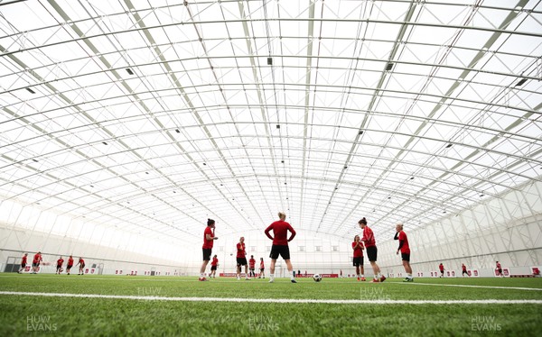 280519 - Wales Women's Football Squad Training Session, USW, Treforest - The Wales Women's Football squad and academy players warm up in the indoor training area at USW Treforest