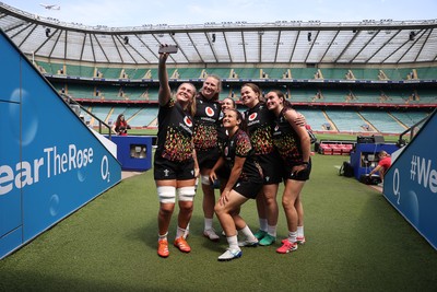260626 - Wales Womens Rugby Captains Run at Twickenham ahead of their game against the Barbarians tomorrow - Alex Callender takes a selfie with team mates at the stadium