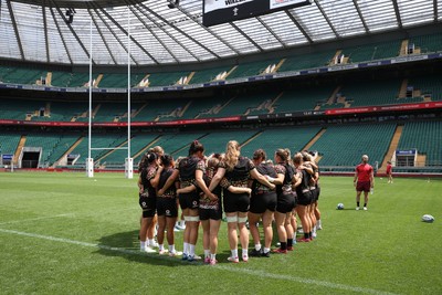 260626 - Wales Womens Rugby Captains Run at Twickenham ahead of their game against the Barbarians tomorrow - Wales team huddle