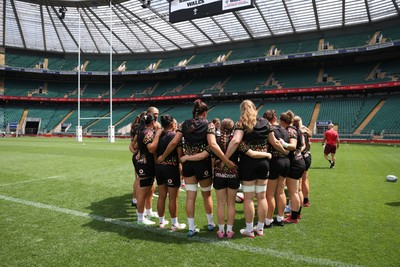 260626 - Wales Womens Rugby Captains Run at Twickenham ahead of their game against the Barbarians tomorrow - Wales team huddle