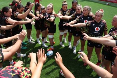 260626 - Wales Womens Rugby Captains Run at Twickenham ahead of their game against the Barbarians tomorrow - Wales team huddle