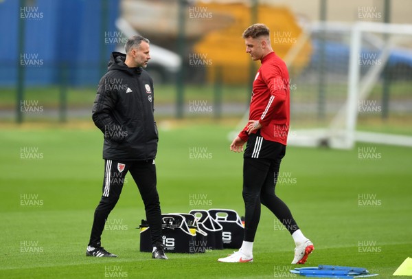 051020 - Wales Football Training - Ryan Giggs talks to Joe Rodon during training