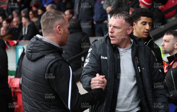 180223 - Newport County v Walsall, EFL Sky Bet League 2 - Walsall manager Michael Flynn, left with Newport County manager Graham Coughlan ahead of the match