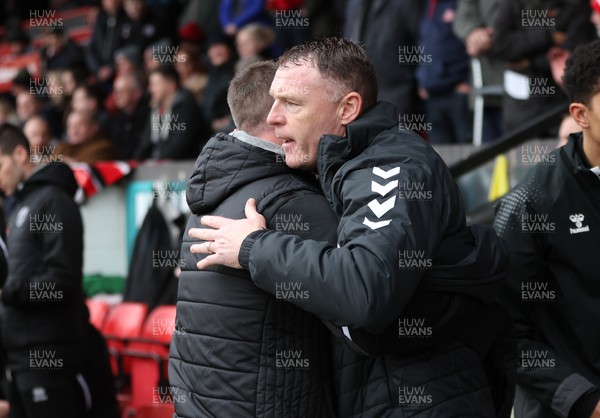 180223 - Newport County v Walsall, EFL Sky Bet League 2 - Walsall manager Michael Flynn, left with Newport County manager Graham Coughlan ahead of the match