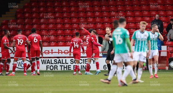 180223 - Newport County v Walsall, EFL Sky Bet League 2 - Walsall players celebrate with Isaac Hutchinson after he scores the opening goal