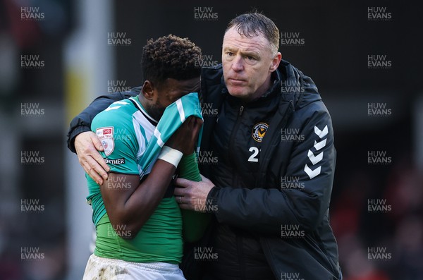 180223 - Newport County v Walsall, EFL Sky Bet League 2 - Newport County manager Graham Coughlan with Offrande Zanzala of Newport County at the end of there match