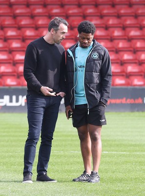 210326 - Walsall v Newport County - Sky Bet League 2 - Newport manager Christian Fuchs and Bobby Kamwa of Newport