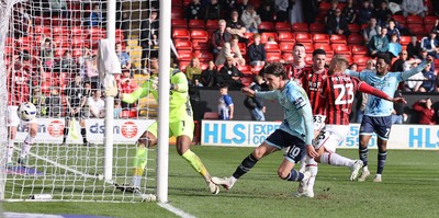 210326 - Walsall v Newport County - Sky Bet League 2 - Harrison Biggins of Newport scores the 1st goal of the match at the end of the 1st half