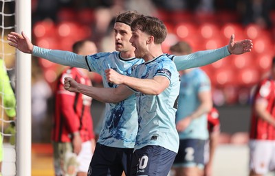 210326 - Walsall v Newport County - Sky Bet League 2 - Harrison Biggins of Newport celebrates scoring the 1st goal of the match at the end of the 1st half with Ben Lloyd of Newport