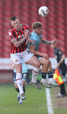 210326 - Walsall v Newport County - Sky Bet League 2 - Cameron Evans of Newport and Kacper Lopata of Walsall FC