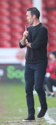 210326 - Walsall v Newport County - Sky Bet League 2 - Newport manager Christian Fuchs directs from the technical area