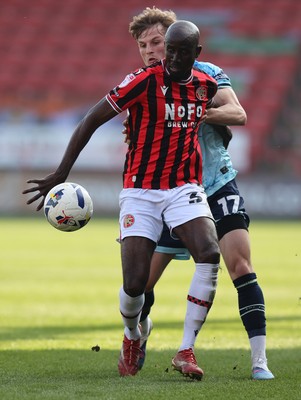 210326 - Walsall v Newport County - Sky Bet League 2 - Tom Davies of Newport and Albert Adman of Walsall FC