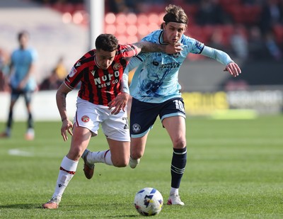 210326 - Walsall v Newport County - Sky Bet League 2 - Harrison Biggins of Newport and Alfie Young of Walsall FC