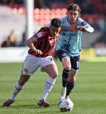 210326 - Walsall v Newport County - Sky Bet League 2 - Harrison Biggins of Newport and Alfie Young of Walsall FC