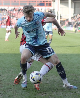 210326 - Walsall v Newport County - Sky Bet League 2 - Tom Davies of Newport and Alex Pattison of Walsall FC