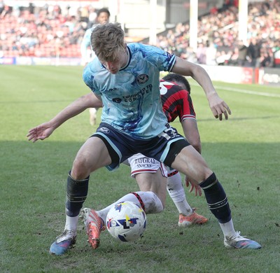 210326 - Walsall v Newport County - Sky Bet League 2 - Tom Davies of Newport and Alex Pattison of Walsall FC