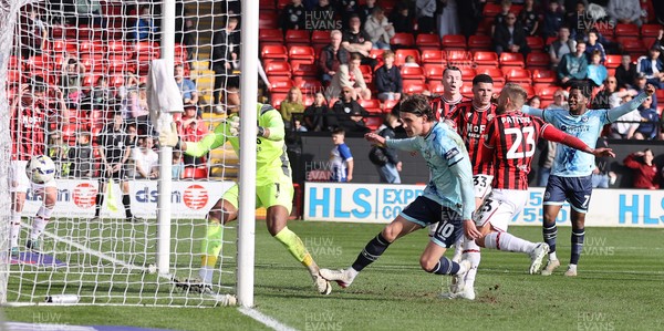 210326 - Walsall v Newport County - Sky Bet League 2 - Harrison Biggins of Newport scores the 1st goal of the match at the end of the 1st half