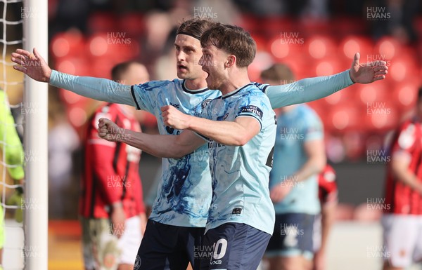 210326 - Walsall v Newport County - Sky Bet League 2 - Harrison Biggins of Newport celebrates scoring the 1st goal of the match at the end of the 1st half with Ben Lloyd of Newport