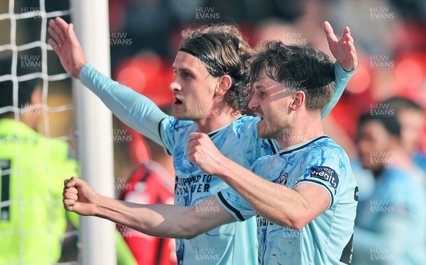 210326 - Walsall v Newport County - Sky Bet League 2 - Harrison Biggins of Newport celebrates scoring the 1st goal of the match at the end of the 1st half with Ben Lloyd of Newport