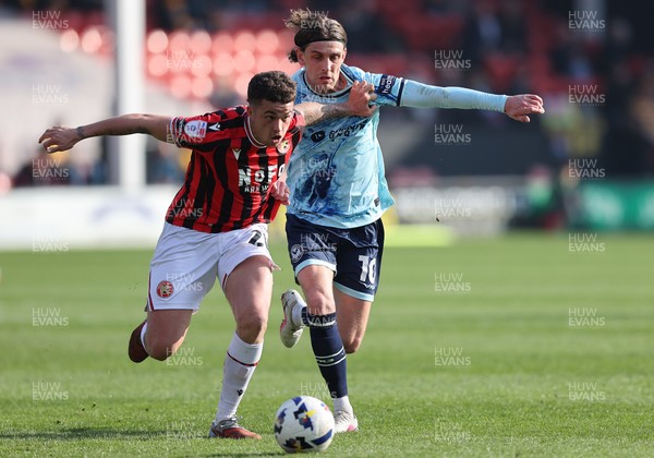 210326 - Walsall v Newport County - Sky Bet League 2 - Harrison Biggins of Newport and Alfie Young of Walsall FC