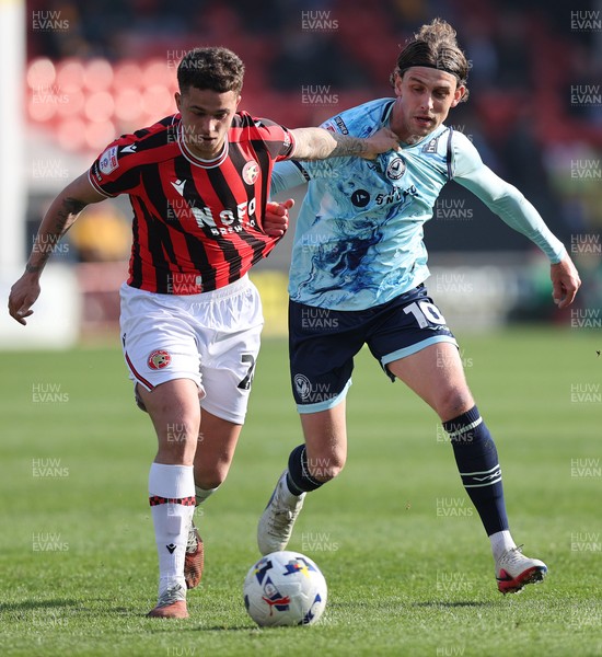 210326 - Walsall v Newport County - Sky Bet League 2 - Harrison Biggins of Newport and Alfie Young of Walsall FC