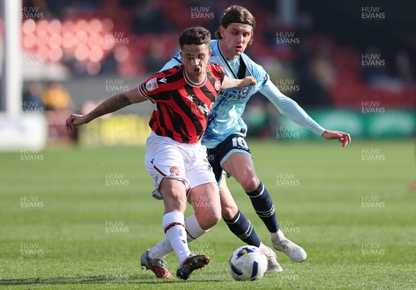 210326 - Walsall v Newport County - Sky Bet League 2 - Harrison Biggins of Newport and Alfie Young of Walsall FC