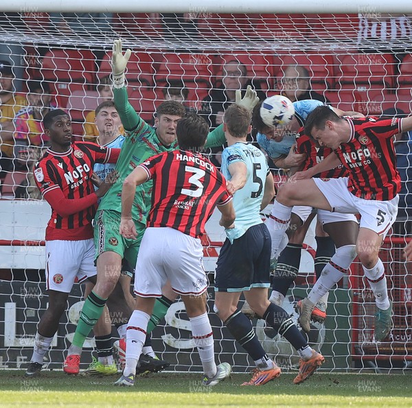 210326 - Walsall v Newport County - Sky Bet League 2 - Jordan Wright of Newport saves a Walsall shot