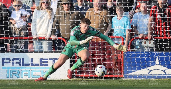 210326 - Walsall v Newport County - Sky Bet League 2 - Goalkeeper Jordan Wright of Newport can’t stop the goal going in