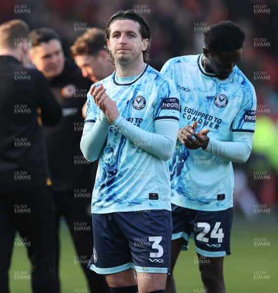210326 - Walsall v Newport County - Sky Bet League 2 - Anthony Glennon of Newport leads team to applaud fans at the end of the match