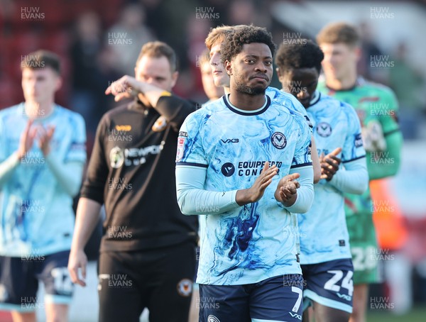 210326 - Walsall v Newport County - Sky Bet League 2 - Bobby Kamwa of Newport leads team to applaud fans at the end of the match
