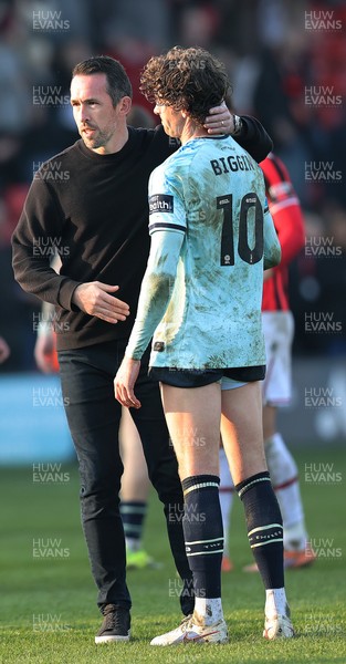 210326 - Walsall v Newport County - Sky Bet League 2 - Newport manager Christian Fuchs consoles Harrison Biggins of Newport at the end of the match
