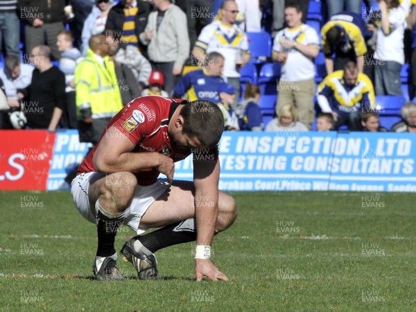 29.03.09 - Warrington Wolves v Celtic Crusaders - engage Super League -  Crusaders Lincoln Withers reacts at the end of the game to the narrow loss 