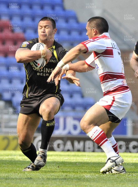 19.04.09 - Wigan Warriors v Celtic Crusaders - Super League -  Crusaders Jason Chan is tackled by Wigan's Thomas Leuluai. 