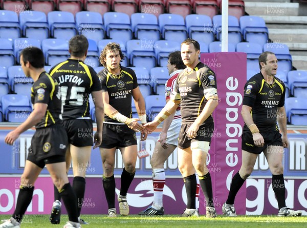 19.04.09 - Wigan Warriors v Celtic Crusaders - Super League -  Crusaders Mark Dalle Cort is congratulated by Mark Bryant after scoring.  