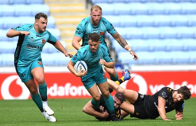 120921 - Wasps v Dragons - Preseason Friendly - Ioan Davies of Dragons is tackled by Elliott Stooke of Wasps