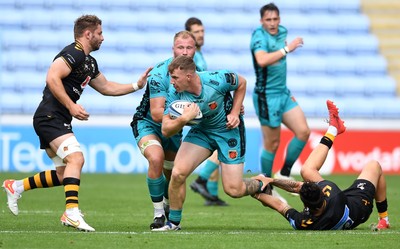 120921 - Wasps v Dragons - Preseason Friendly - Jack Dixon of Dragons is tackled by Jacob Umaga of Wasps