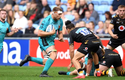 120921 - Wasps v Dragons - Preseason Friendly - Ben Carter of Dragons takes on Jacob Umaga of Wasps