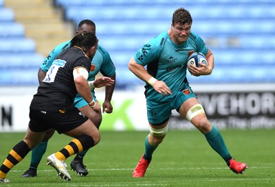 120921 - Wasps v Dragons - Preseason Friendly - Will Rowlands of Dragons is tackled by Robin Hislop of Wasps