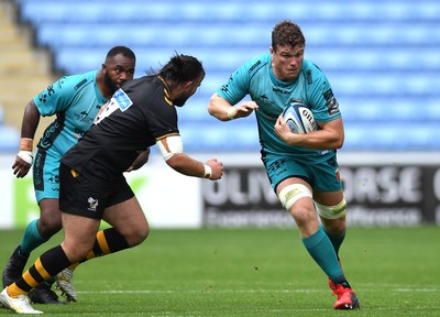 120921 - Wasps v Dragons - Preseason Friendly - Will Rowlands of Dragons is tackled by Robin Hislop of Wasps