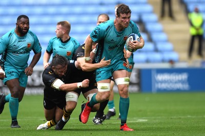 120921 - Wasps v Dragons - Preseason Friendly - Will Rowlands of Dragons is tackled by Thomas Young of Wasps