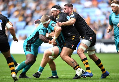 120921 - Wasps v Dragons - Preseason Friendly - Aaron Wainwright of Dragons is tackled by Jeff Toomaga-Allen of Wasps